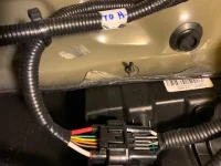 to the connector going to the hitch harness.webp